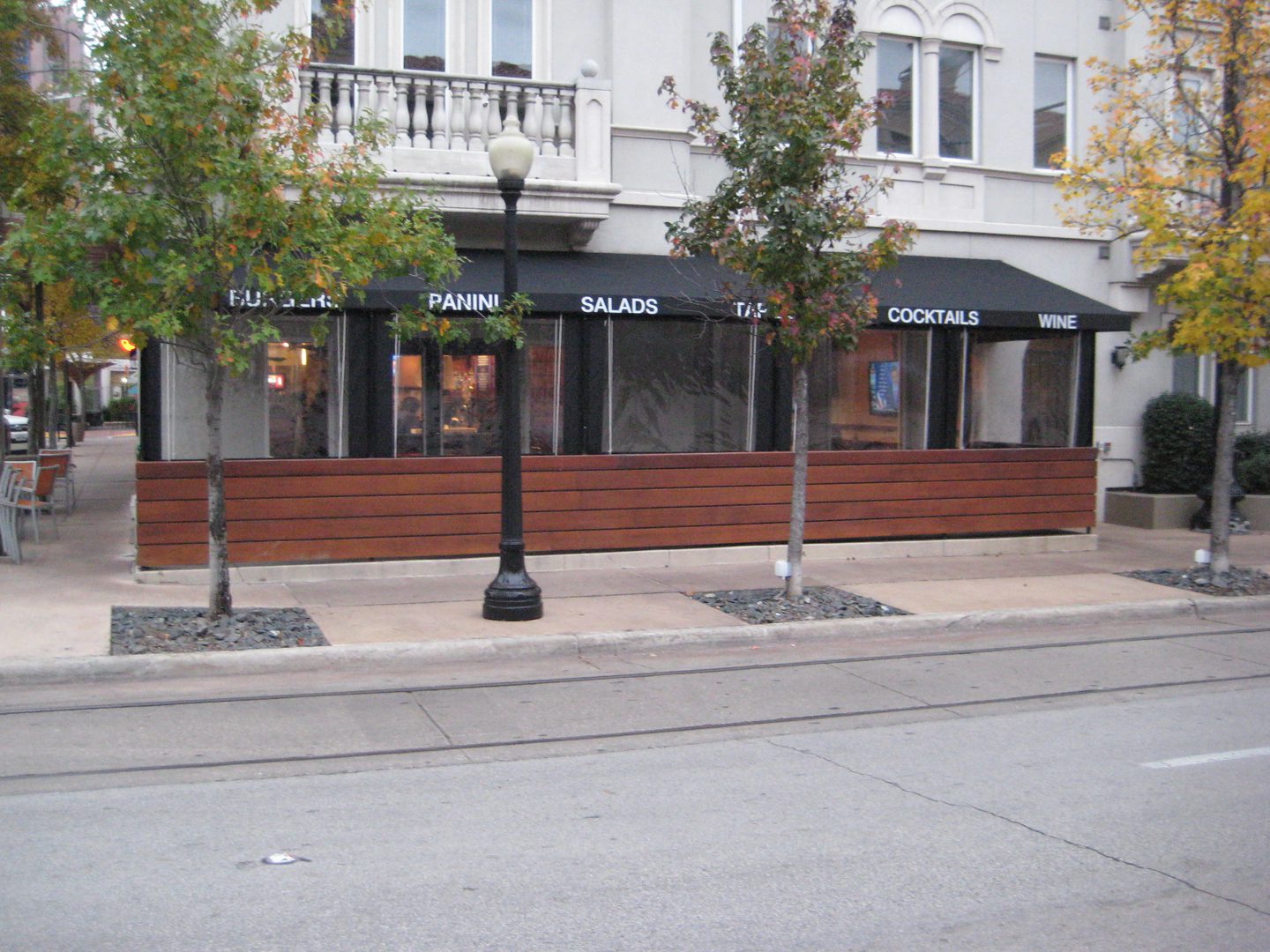 Front view of a store with a black roof